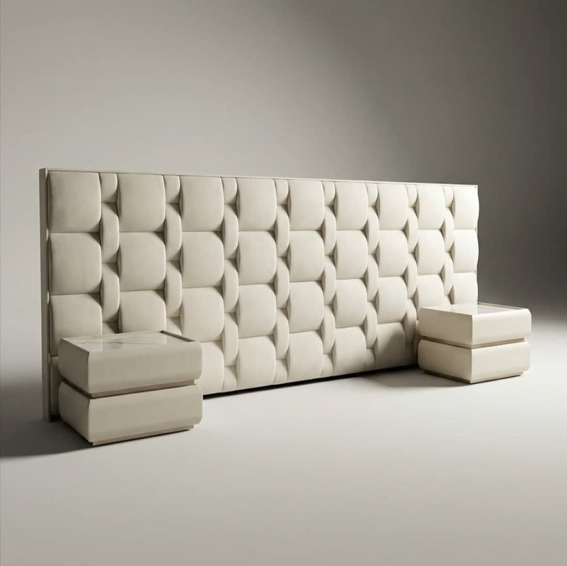 Cream headboard in deep quilted squares, with a matching upholstered side unit on each side.